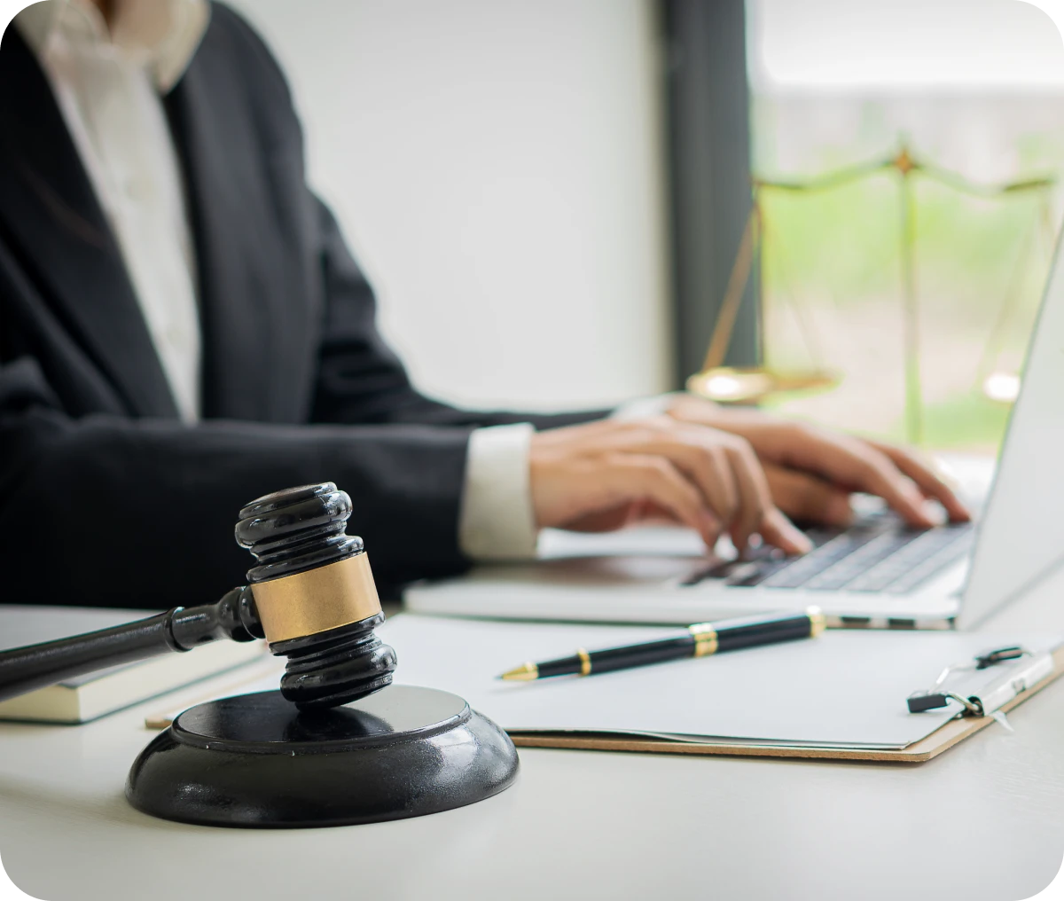 Legal professional working on laptop